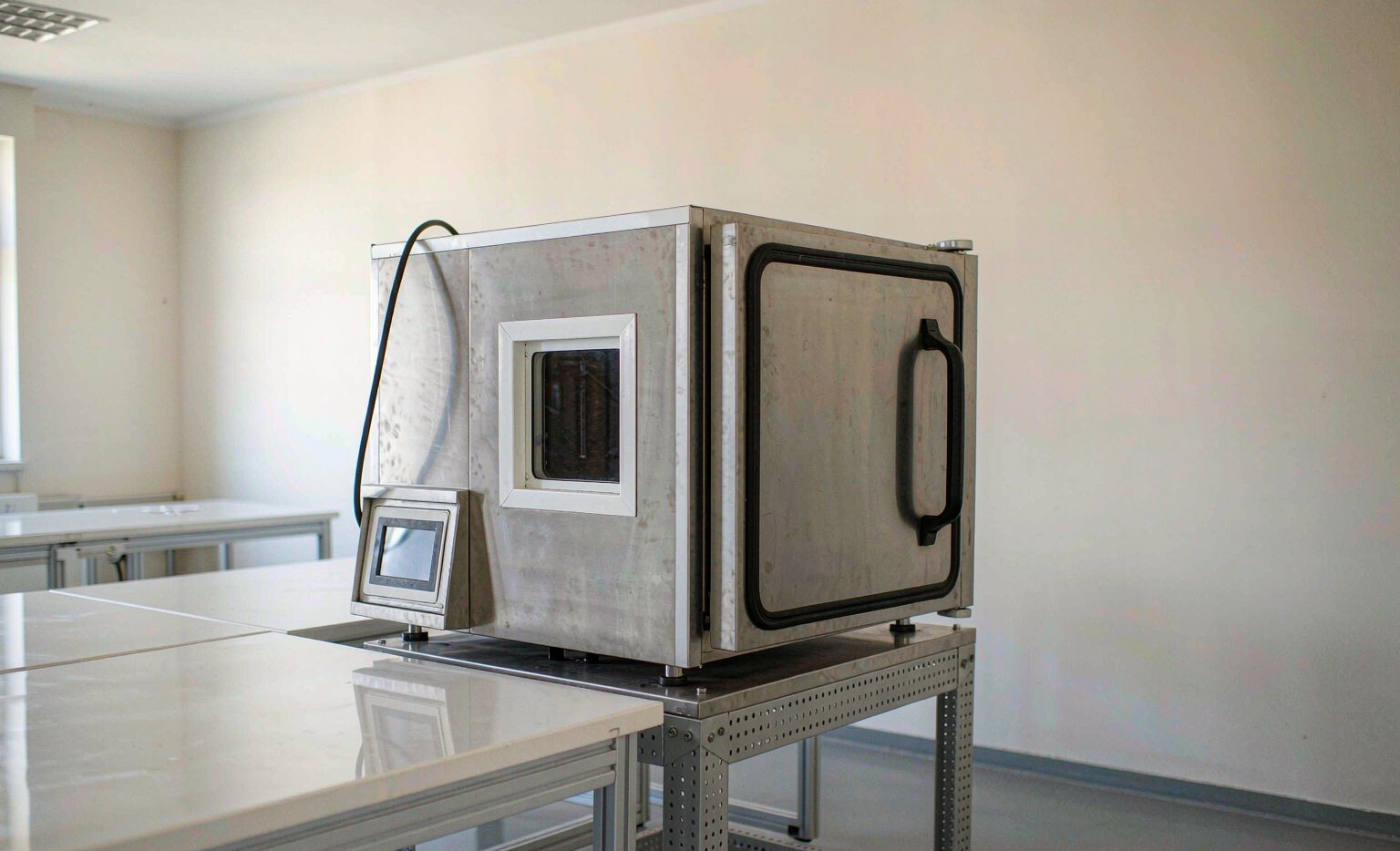 High-low temperature test chamber with controller panel in a university research laboratory
