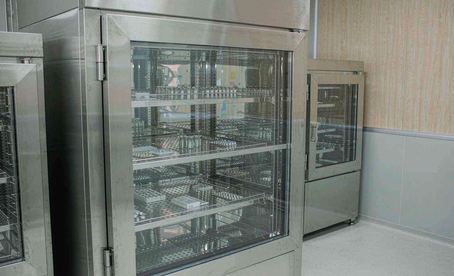 Pharmaceutical stability chamber with vials and blister packs in a clean GMP laboratory